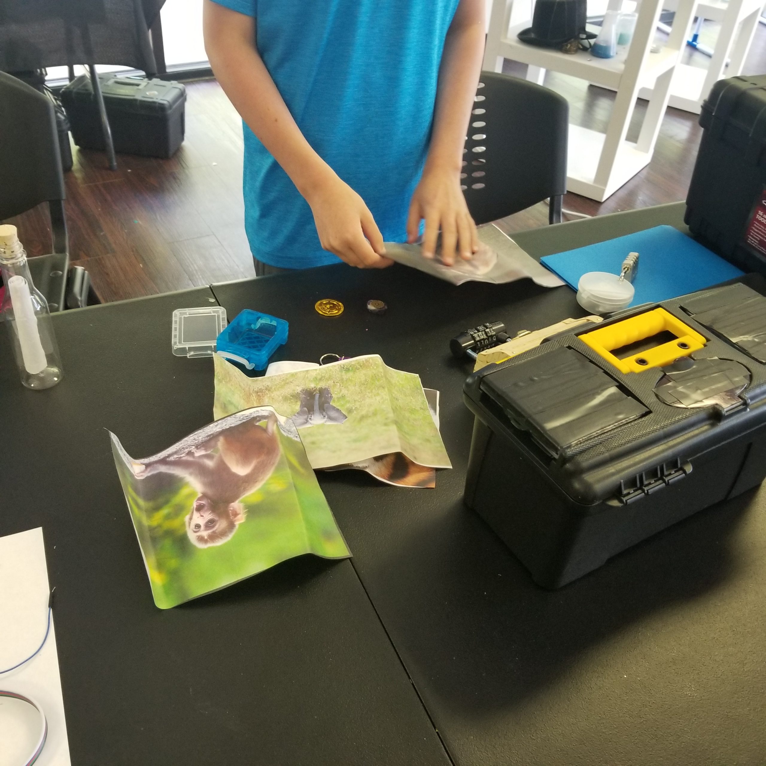 kid with escape room game box